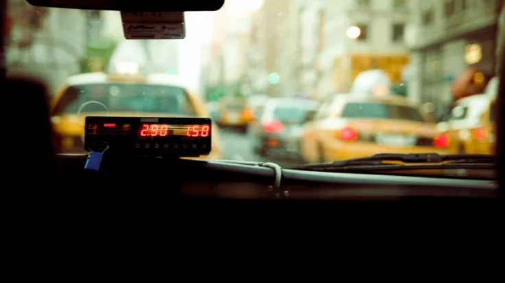 Taxi meter and cards. Photo credit to John Cobb.