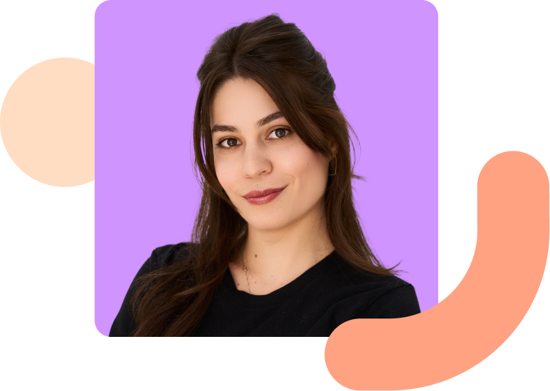 Image shows a smiling woman with a purple background